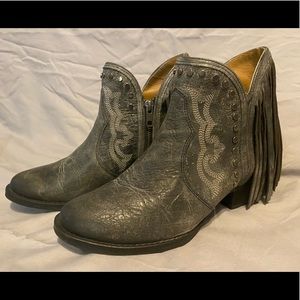 Sterling river distressed black fringe boots